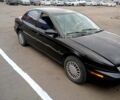 Чорний Сатурн SL, об'ємом двигуна 1.9 л та пробігом 111 тис. км за 1600 $, фото 1 на Automoto.ua