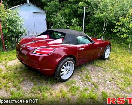 Красный Сатурн Скай, объемом двигателя 2 л и пробегом 252 тыс. км за 14999 $, фото 1 на Automoto.ua