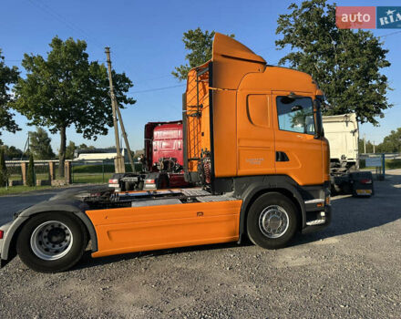Помаранчевий Сканіа R 410, об'ємом двигуна 12.7 л та пробігом 898 тис. км за 29500 $, фото 4 на Automoto.ua