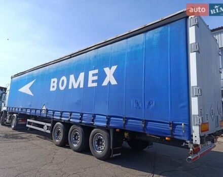 Красный Шмитц Каргобулл SSD, объемом двигателя 6 л и пробегом 250 тыс. км за 8593 $, фото 1 на Automoto.ua