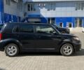 Черный Сцион ХБ, объемом двигателя 2.4 л и пробегом 148 тыс. км за 9590 $, фото 4 на Automoto.ua