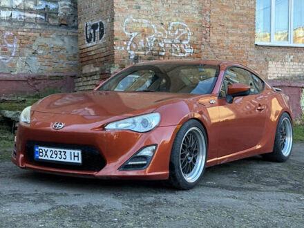 Оранжевый Сцион FR-S, объемом двигателя 2 л и пробегом 160 тыс. км за 14300 $, фото 1 на Automoto.ua