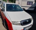 Белый Шкода Фабия, объемом двигателя 1.4 л и пробегом 246 тыс. км за 2100 $, фото 1 на Automoto.ua