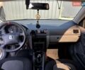 Белый Шкода Фабия, объемом двигателя 1.4 л и пробегом 263 тыс. км за 4000 $, фото 1 на Automoto.ua