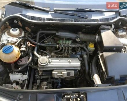 Белый Шкода Фабия, объемом двигателя 1.4 л и пробегом 237 тыс. км за 3000 $, фото 5 на Automoto.ua