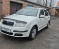 Белый Шкода Фабия, объемом двигателя 1.2 л и пробегом 253 тыс. км за 3900 $, фото 1 на Automoto.ua