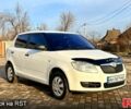 Белый Шкода Фабия, объемом двигателя 1.2 л и пробегом 140 тыс. км за 3950 $, фото 1 на Automoto.ua