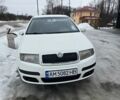 Белый Шкода Фабия, объемом двигателя 1.39 л и пробегом 206 тыс. км за 3200 $, фото 1 на Automoto.ua