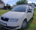 Белый Шкода Фабия, объемом двигателя 1.39 л и пробегом 420 тыс. км за 3500 $, фото 1 на Automoto.ua