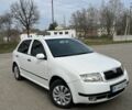 Белый Шкода Фабия, объемом двигателя 1.4 л и пробегом 250 тыс. км за 2500 $, фото 1 на Automoto.ua