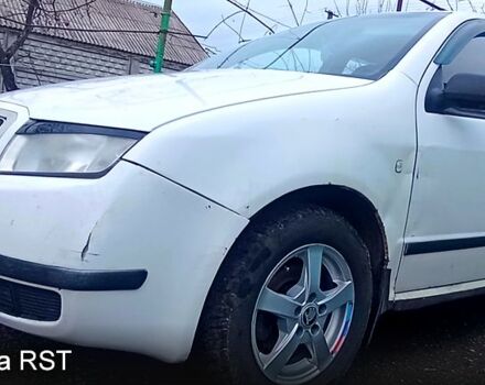 Белый Шкода Фабия, объемом двигателя 1.4 л и пробегом 285 тыс. км за 2350 $, фото 1 на Automoto.ua