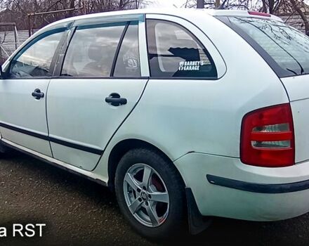 Белый Шкода Фабия, объемом двигателя 1.4 л и пробегом 285 тыс. км за 2350 $, фото 6 на Automoto.ua