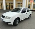 Белый Шкода Фабия, объемом двигателя 1.39 л и пробегом 227 тыс. км за 1600 $, фото 1 на Automoto.ua