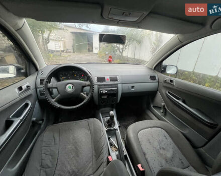 Белый Шкода Фабия, объемом двигателя 1.2 л и пробегом 303 тыс. км за 1800 $, фото 9 на Automoto.ua