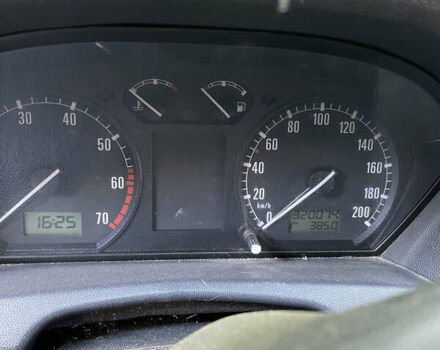 Белый Шкода Фабия, объемом двигателя 1.2 л и пробегом 330 тыс. км за 200 $, фото 2 на Automoto.ua