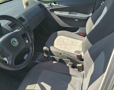 Белый Шкода Фабия, объемом двигателя 1.4 л и пробегом 312 тыс. км за 2900 $, фото 5 на Automoto.ua