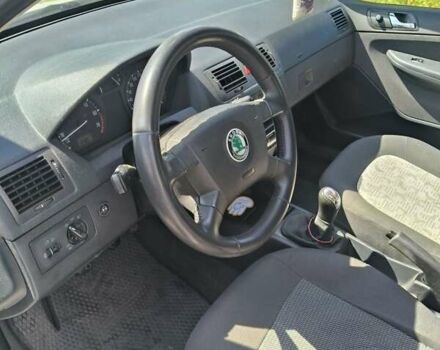 Белый Шкода Фабия, объемом двигателя 1.4 л и пробегом 312 тыс. км за 2900 $, фото 1 на Automoto.ua