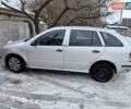 Белый Шкода Фабия, объемом двигателя 1.2 л и пробегом 230 тыс. км за 2650 $, фото 1 на Automoto.ua