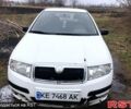Белый Шкода Фабия, объемом двигателя 1.2 л и пробегом 320 тыс. км за 2400 $, фото 1 на Automoto.ua