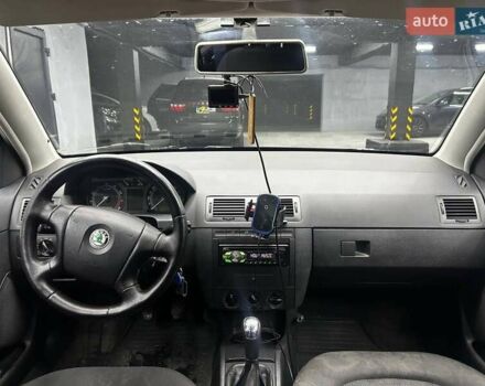 Белый Шкода Фабия, объемом двигателя 1.39 л и пробегом 293 тыс. км за 4700 $, фото 9 на Automoto.ua