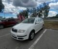 Белый Шкода Фабия, объемом двигателя 1.2 л и пробегом 328 тыс. км за 3500 $, фото 1 на Automoto.ua