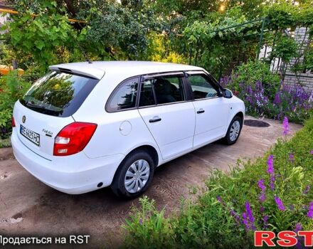 Белый Шкода Фабия, объемом двигателя 1.2 л и пробегом 195 тыс. км за 5200 $, фото 6 на Automoto.ua