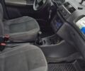 Белый Шкода Фабия, объемом двигателя 1.4 л и пробегом 225 тыс. км за 3950 $, фото 4 на Automoto.ua