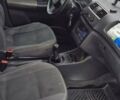 Белый Шкода Фабия, объемом двигателя 1.39 л и пробегом 225 тыс. км за 3950 $, фото 4 на Automoto.ua