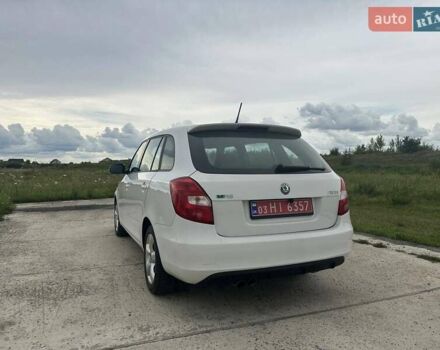 Белый Шкода Фабия, объемом двигателя 1.4 л и пробегом 202 тыс. км за 7850 $, фото 11 на Automoto.ua