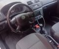 Белый Шкода Фабия, объемом двигателя 1.2 л и пробегом 255 тыс. км за 5700 $, фото 4 на Automoto.ua
