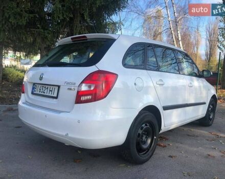 Белый Шкода Фабия, объемом двигателя 1.39 л и пробегом 204 тыс. км за 5500 $, фото 1 на Automoto.ua