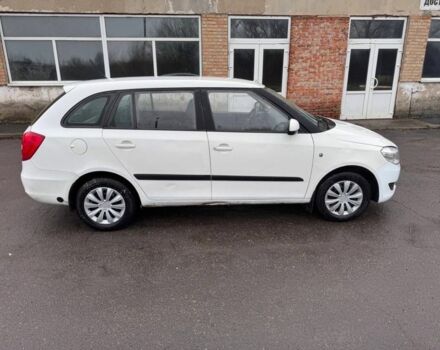 Белый Шкода Фабия, объемом двигателя 1.4 л и пробегом 230 тыс. км за 4500 $, фото 2 на Automoto.ua