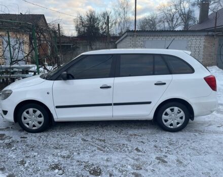 Белый Шкода Фабия, объемом двигателя 1.2 л и пробегом 208 тыс. км за 5300 $, фото 1 на Automoto.ua
