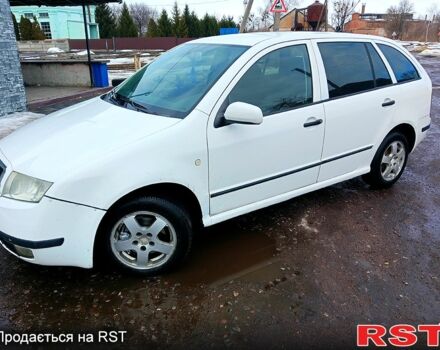 Белый Шкода Фабия, объемом двигателя 1.2 л и пробегом 328 тыс. км за 2400 $, фото 1 на Automoto.ua