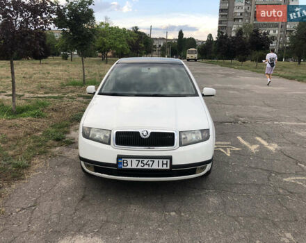 Белый Шкода Фабия, объемом двигателя 1.4 л и пробегом 255 тыс. км за 3800 $, фото 1 на Automoto.ua