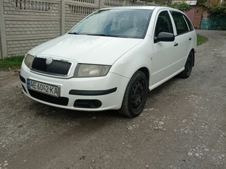 Белый Шкода Фабия, объемом двигателя 1.4 л и пробегом 315 тыс. км за 3700 $, фото 1 на Automoto.ua