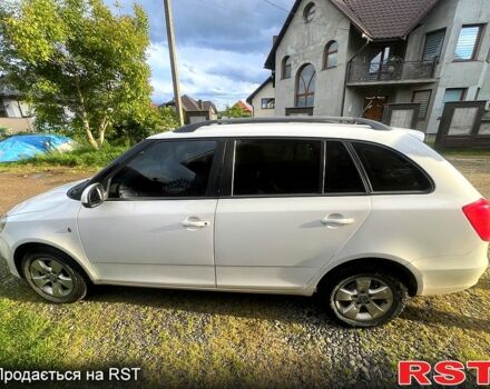 Белый Шкода Фабия, объемом двигателя 1.2 л и пробегом 214 тыс. км за 5200 $, фото 1 на Automoto.ua