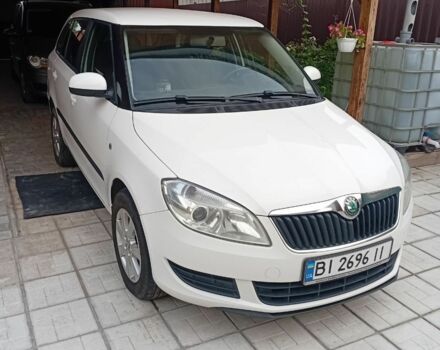 Шкода Фабия 2013 в Полтаве на Automoto.ua Белый Шкода Фабия, объемом двигателя 1.6 л и пробегом 172 тыс. км за 6000 $, фото 1 на Automoto.ua