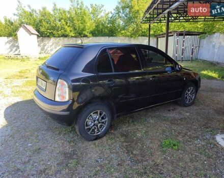 Черный Шкода Фабия, объемом двигателя 1.4 л и пробегом 290 тыс. км за 4500 $, фото 3 на Automoto.ua
