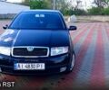 Черный Шкода Фабия, объемом двигателя 1.4 л и пробегом 205 тыс. км за 3500 $, фото 1 на Automoto.ua