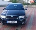 Черный Шкода Фабия, объемом двигателя 1.39 л и пробегом 205 тыс. км за 3500 $, фото 1 на Automoto.ua