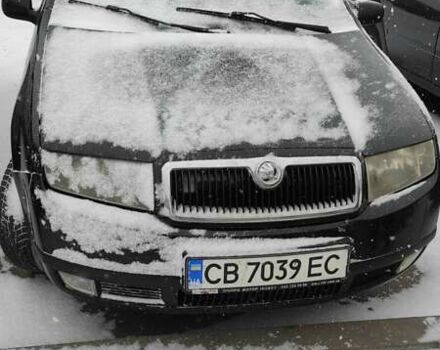 Черный Шкода Фабия, объемом двигателя 1.4 л и пробегом 450 тыс. км за 3300 $, фото 1 на Automoto.ua