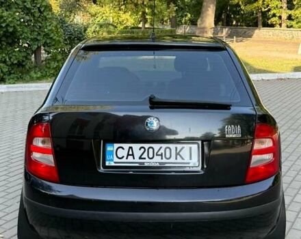 Черный Шкода Фабия, объемом двигателя 1.39 л и пробегом 176 тыс. км за 2999 $, фото 5 на Automoto.ua