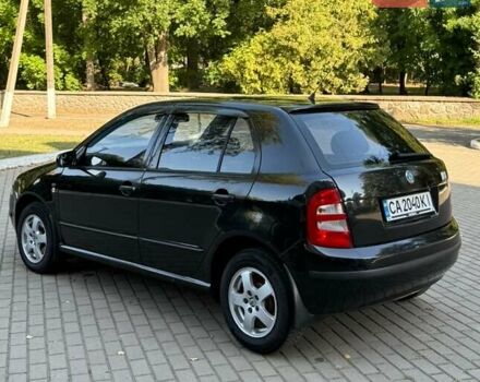 Черный Шкода Фабия, объемом двигателя 1.39 л и пробегом 176 тыс. км за 2999 $, фото 4 на Automoto.ua