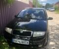 Черный Шкода Фабия, объемом двигателя 1.4 л и пробегом 218 тыс. км за 3800 $, фото 1 на Automoto.ua
