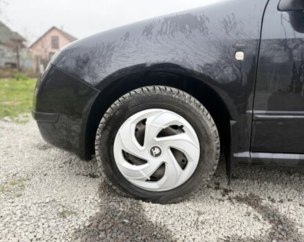 Черный Шкода Фабия, объемом двигателя 1.4 л и пробегом 201 тыс. км за 4100 $, фото 3 на Automoto.ua