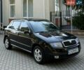 Черный Шкода Фабия, объемом двигателя 1.39 л и пробегом 176 тыс. км за 2999 $, фото 1 на Automoto.ua
