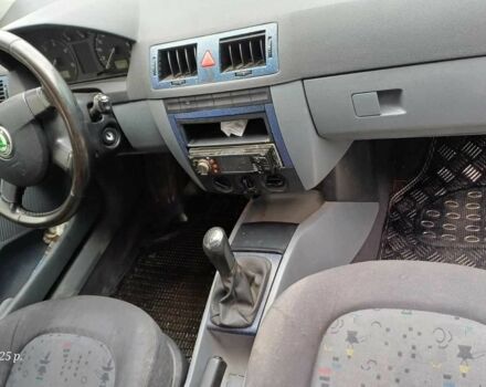 Черный Шкода Фабия, объемом двигателя 1 л и пробегом 240 тыс. км за 1900 $, фото 2 на Automoto.ua