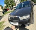 Черный Шкода Фабия, объемом двигателя 1.2 л и пробегом 240 тыс. км за 3189 $, фото 1 на Automoto.ua
