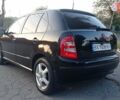Черный Шкода Фабия, объемом двигателя 1.2 л и пробегом 260 тыс. км за 3450 $, фото 2 на Automoto.ua